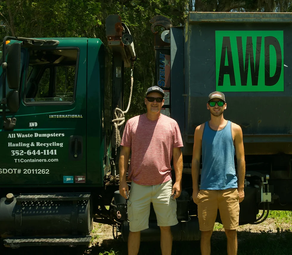 AWD team standing in front of a truck